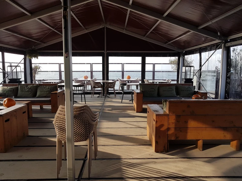 Terrace roofing Urk beach pavilion during the winter months.